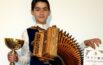 Riccardo Compagnoni, che talento: ad 11 anni incanta con il suo organetto